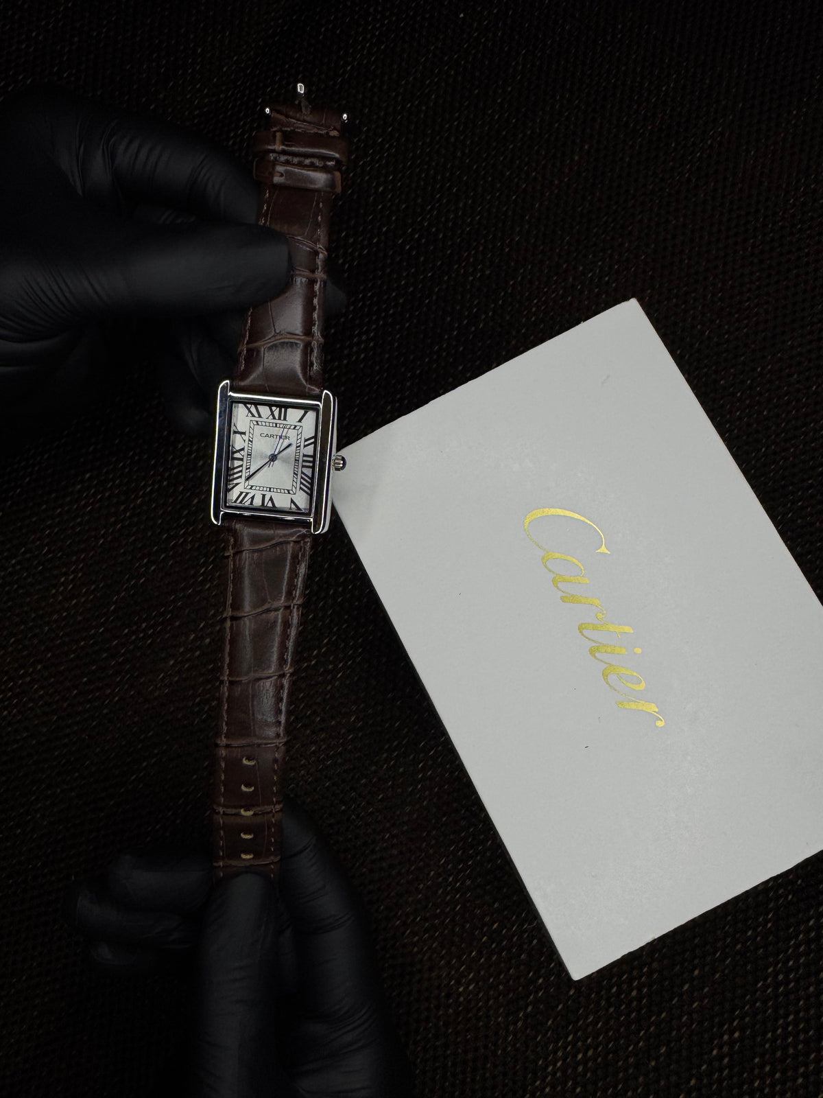 Cartier tank | brown silver roman dial