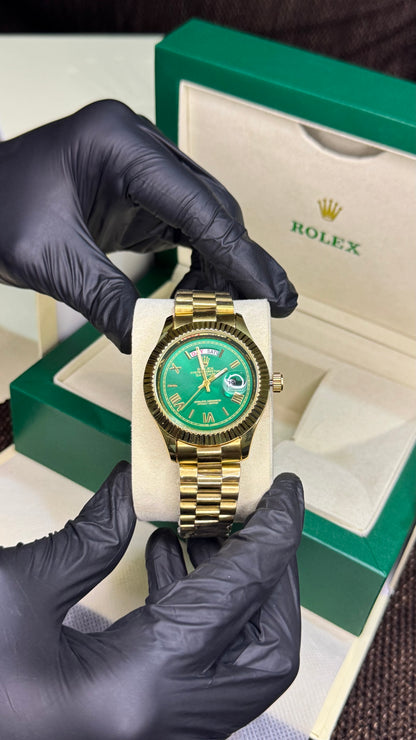 Rolex  | golden green roman dial