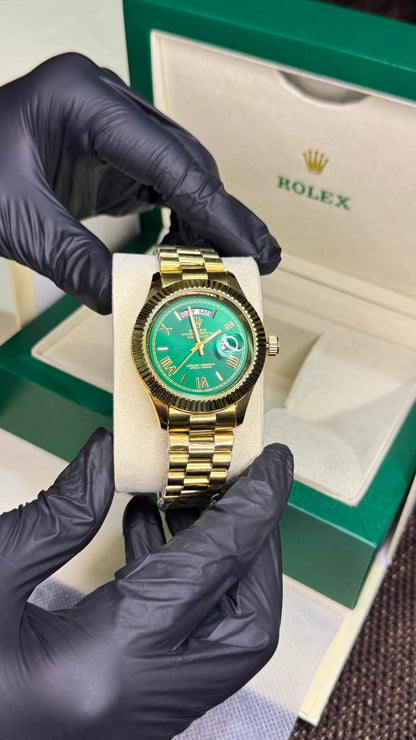 Rolex  | golden green roman dial